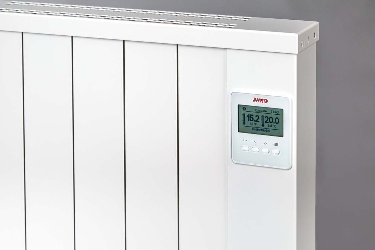 Detail van een Jawotherm radiator met de thermostaat aan de zijkant