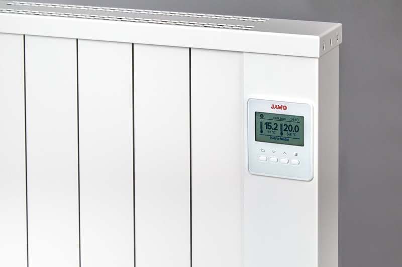 Detail van een Jawotherm radiator met de thermostaat aan de zijkant